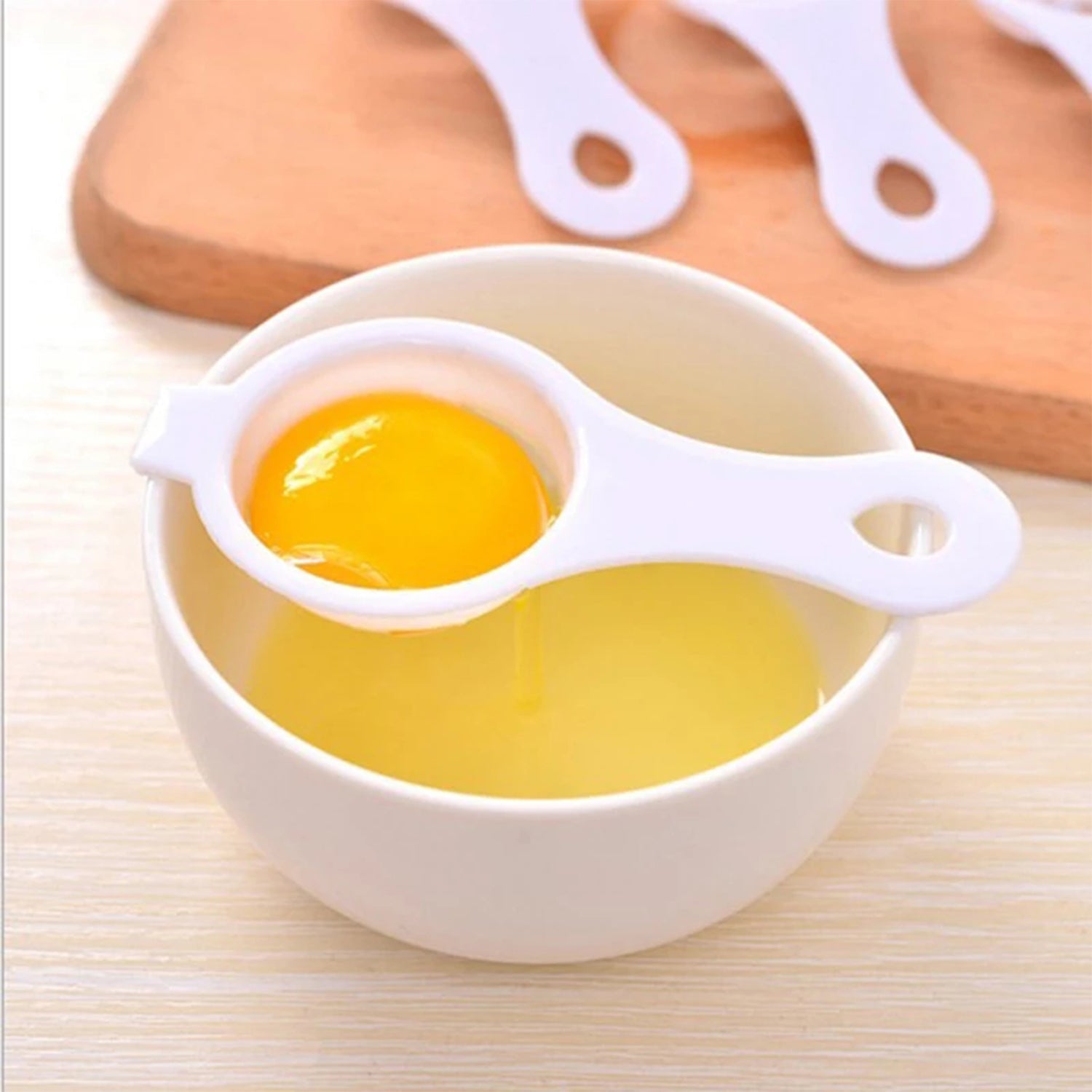 Kitchen tool for quick egg yolk separation.